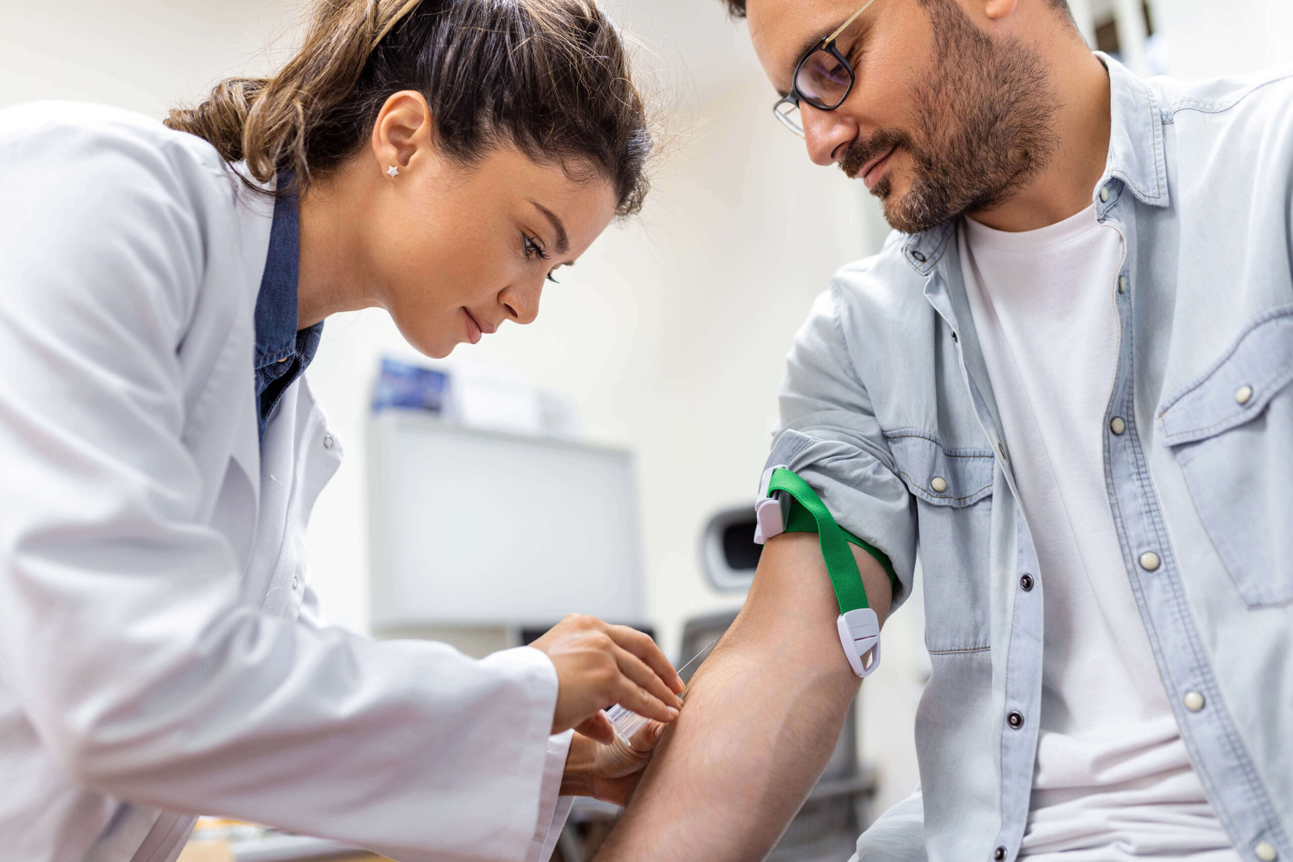 Nurse giving a person shot
